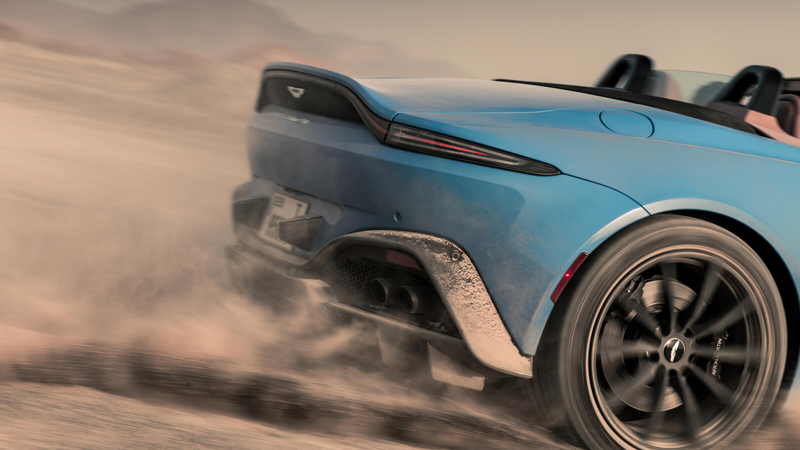 Free photo Aston Martin Vantage in the dust