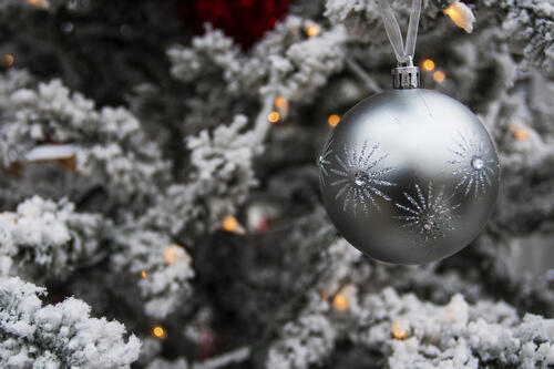 A Christmas ball on a gray firkin