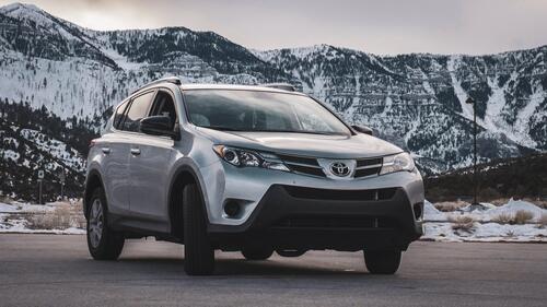 Toyota rav 4 silver color in the mountains