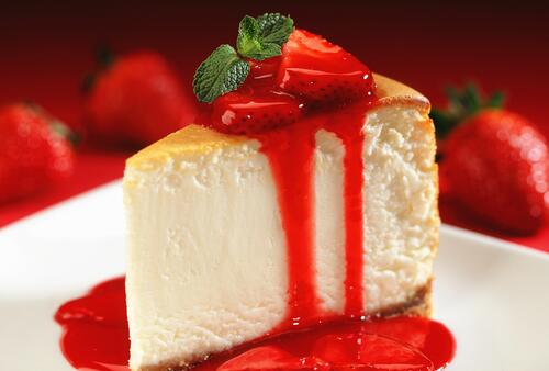 A slice of delicious strawberry cake