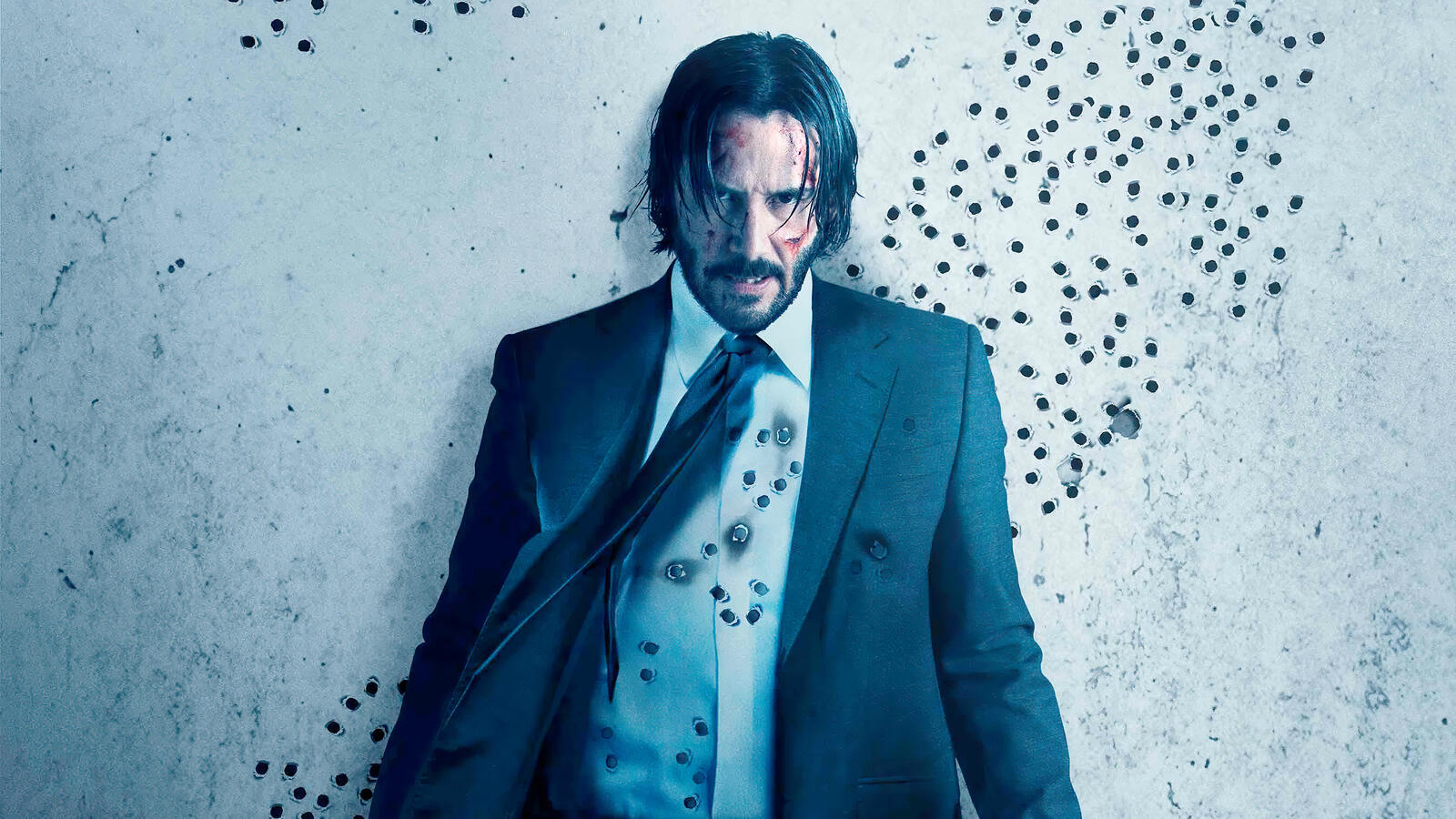 Free photo John Wick stands at the shot wall