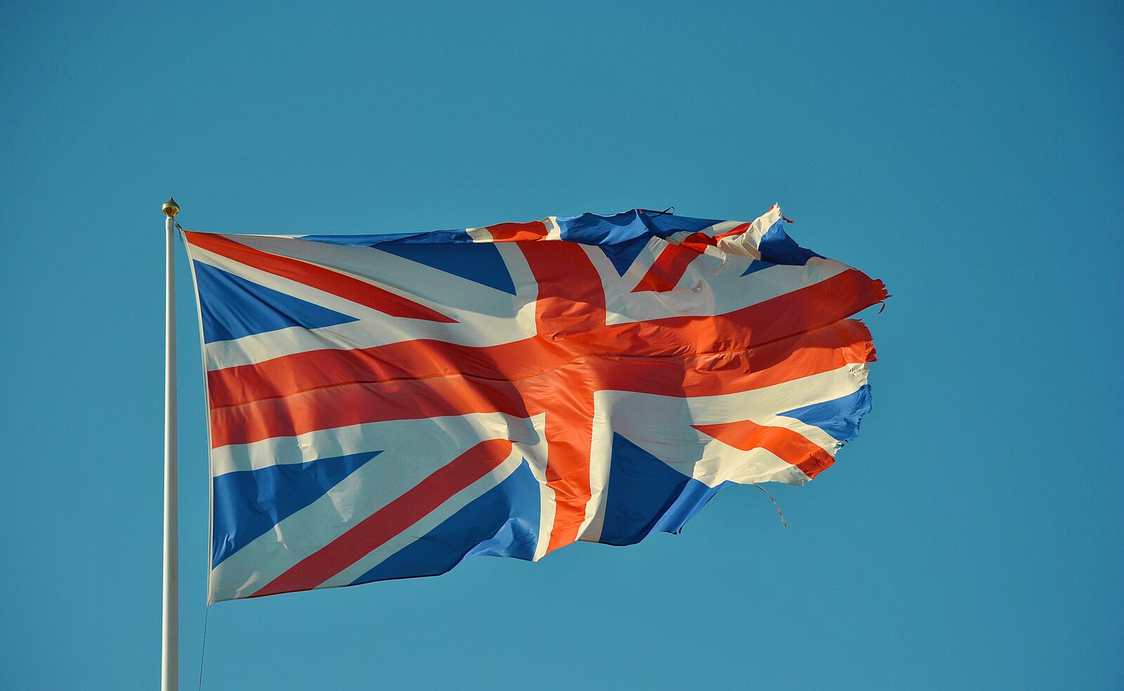 Free photo The flag of Great Britain is flying in the wind