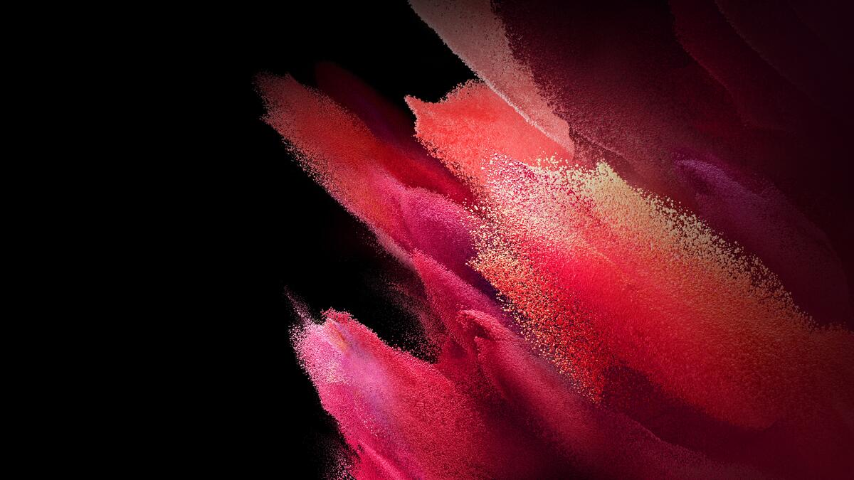 Абстракция в виде розового песка на черном фоне