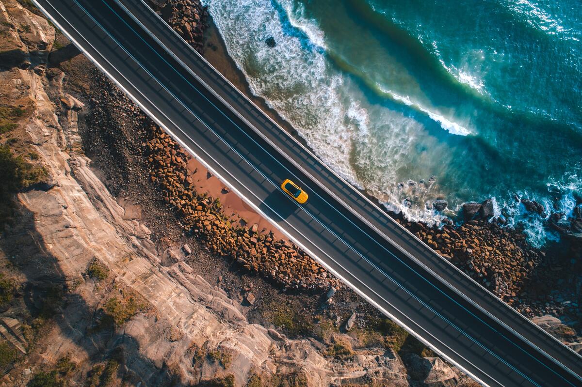 Asphalt road along the sea as seen from above