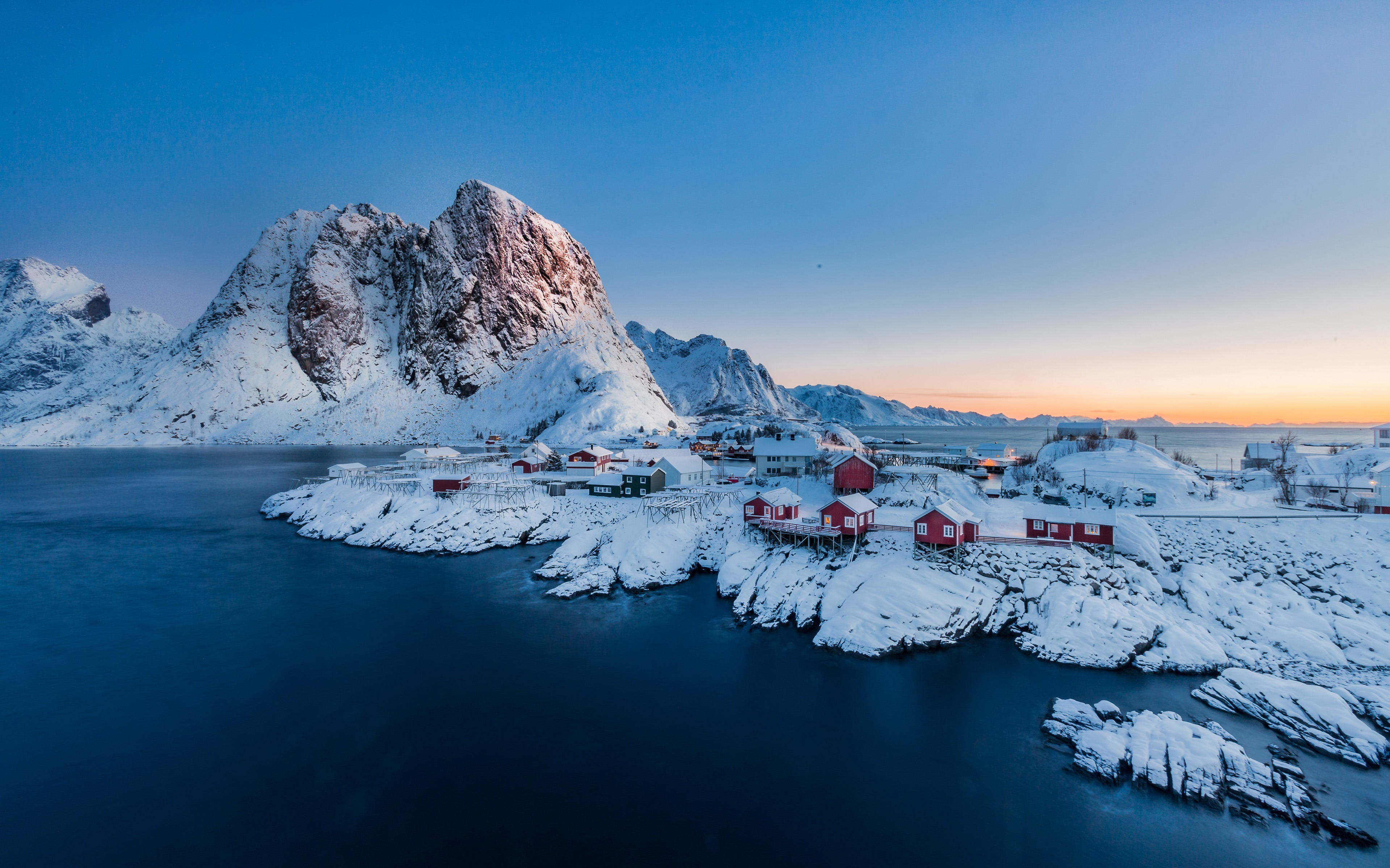 Red houses on the ocean in Norway