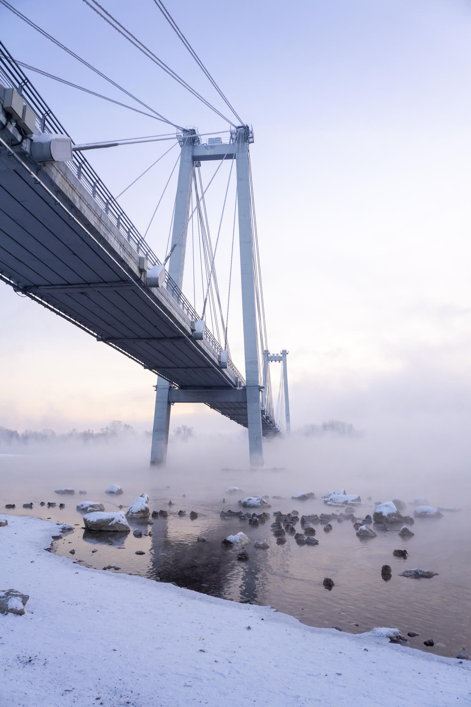 Free photo Frosty morning at the bridge over the Yenisei River