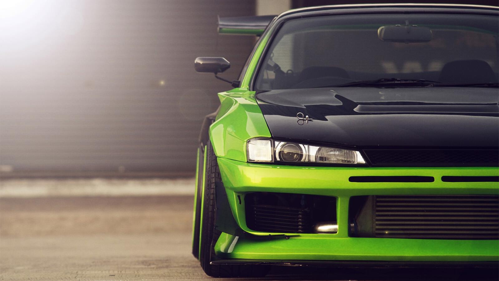 Бесплатное фото Ярко-зеленый Nissan Silvia