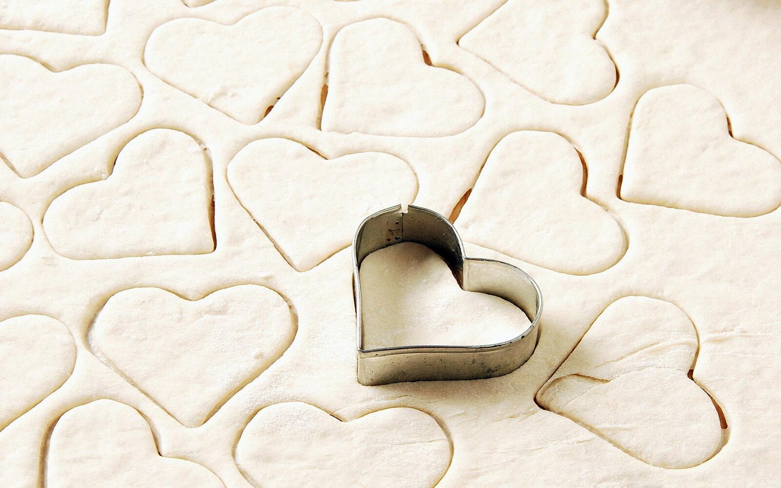Free photo Iron heart-shaped mold for dough