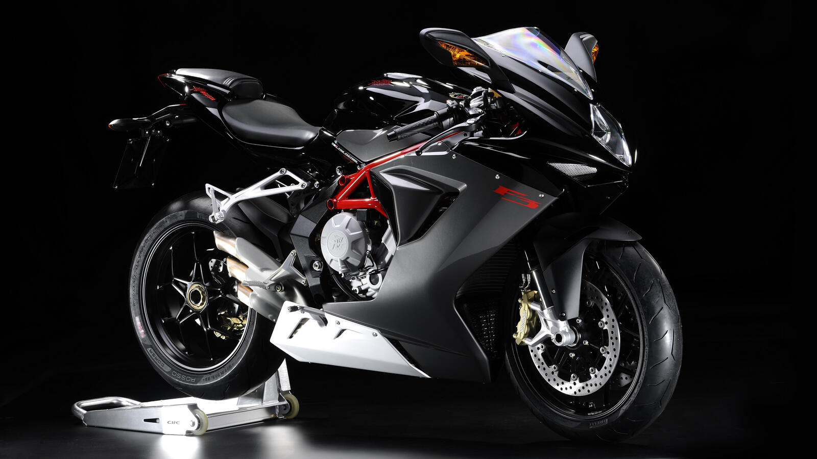 Бесплатное фото Картинка с крутым спортивным мотоциклом на черном фоне