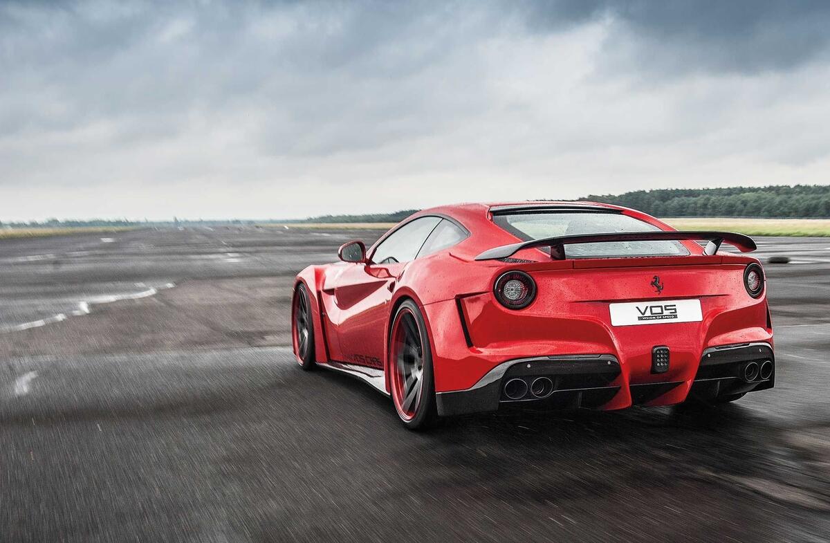 Red Ferrari on the runway