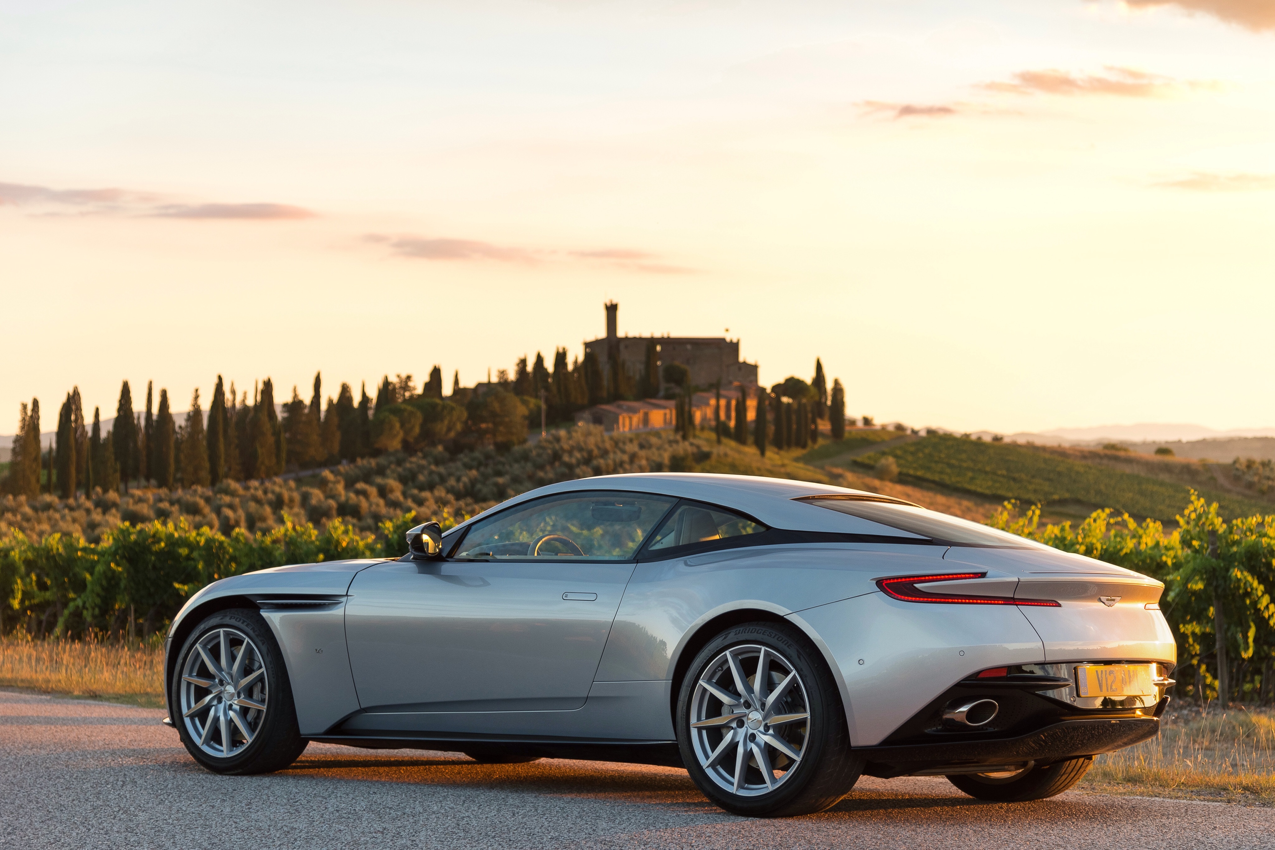 Aston Martin against the backdrop of the sunset