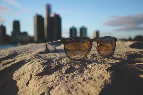 Sunglasses on a rock