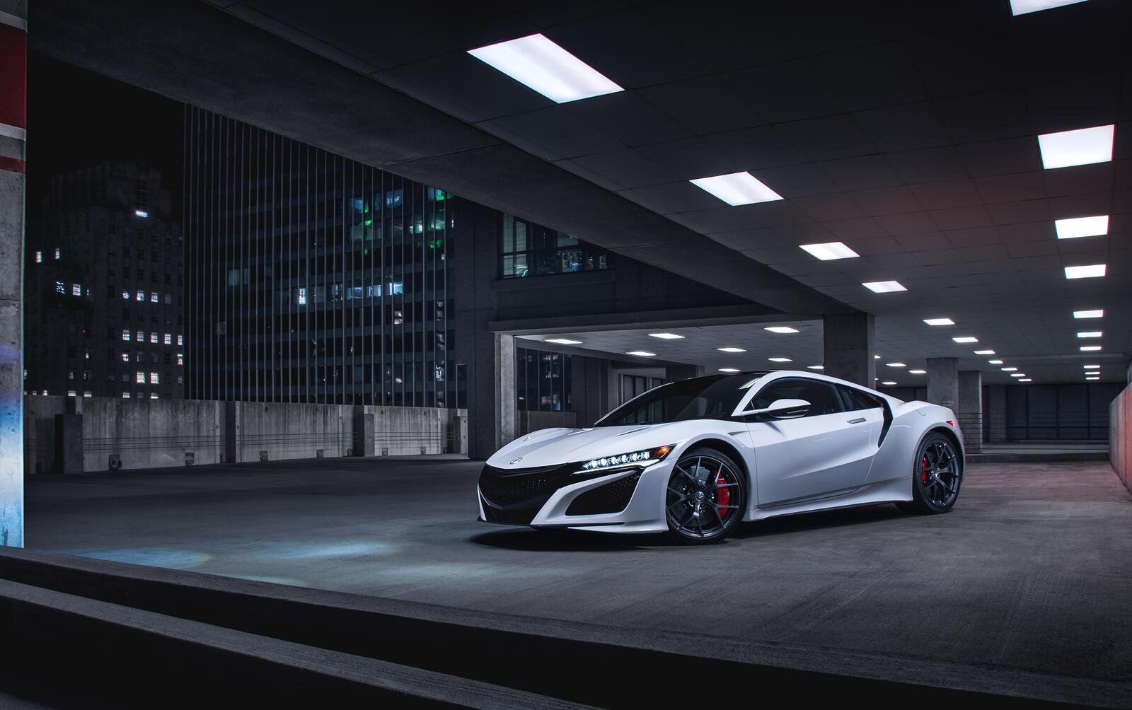 Free photo Acura NSX in white in an underground parking lot