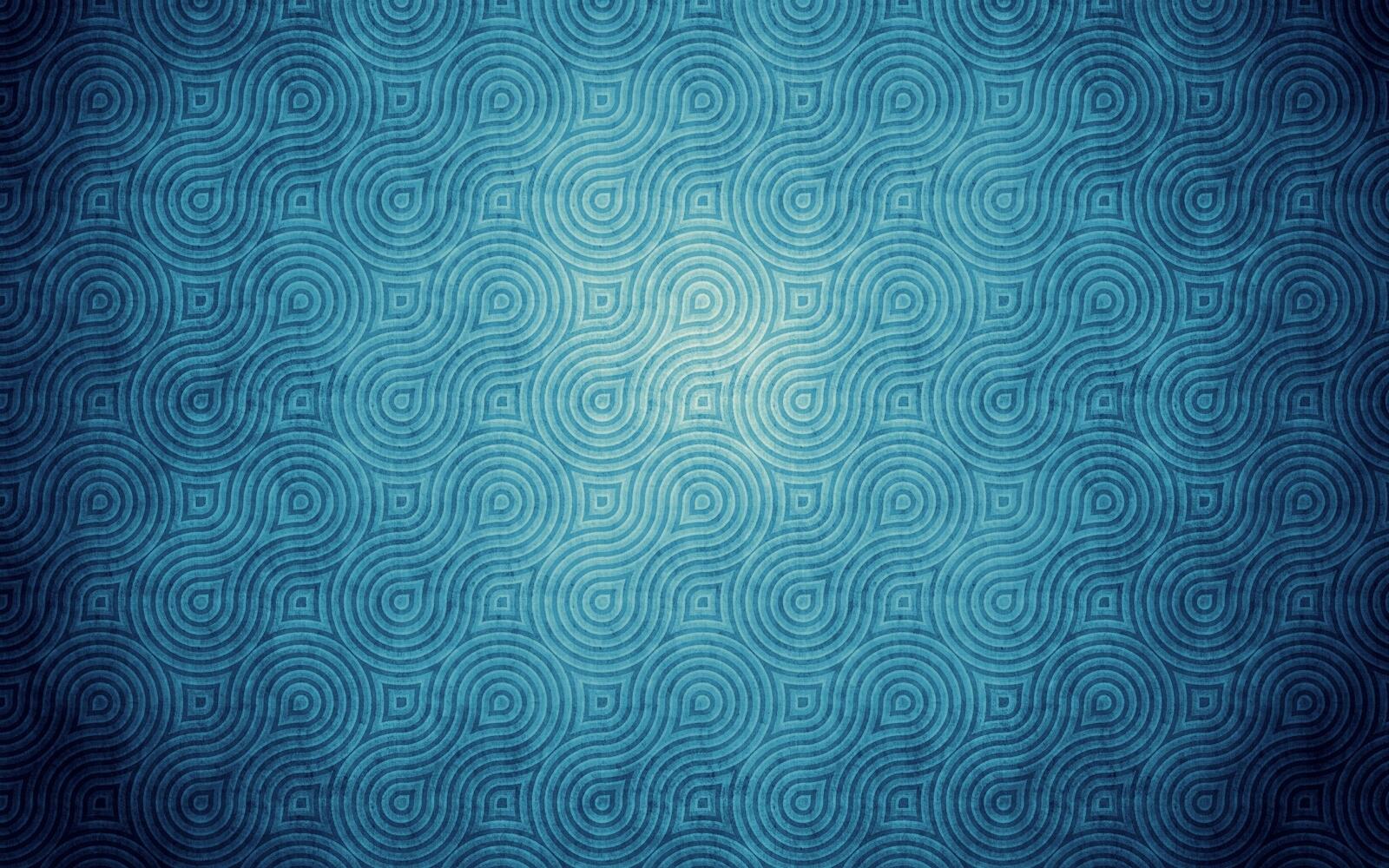 Free photo Symmetrical pattern on a blue background