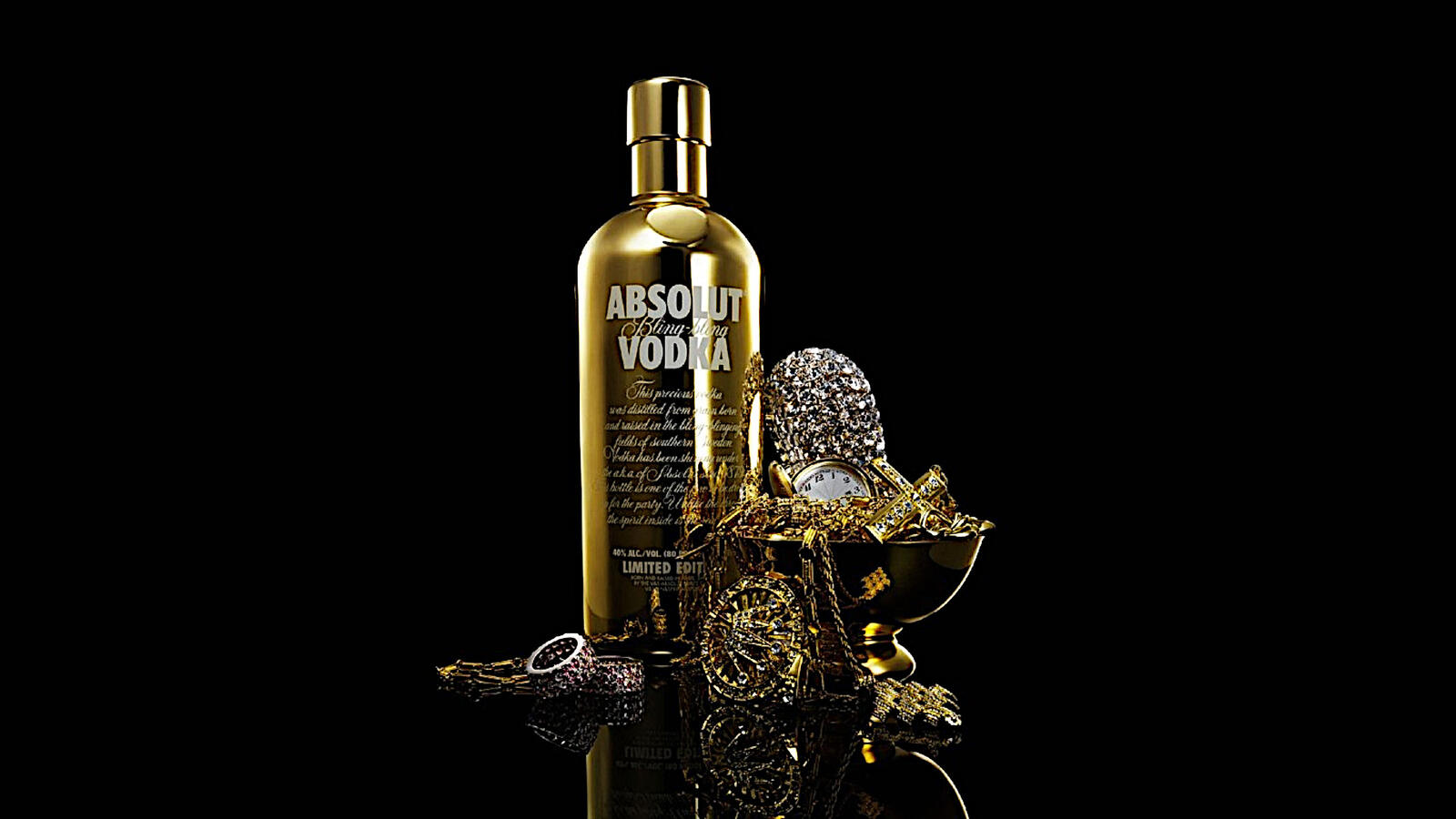 Free photo Vodka absolute with gold jewelry