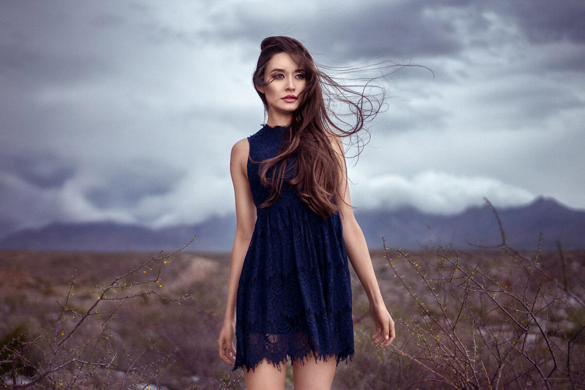 A girl in a short blue dress