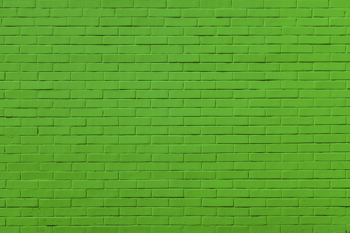 Brick wall painted green.