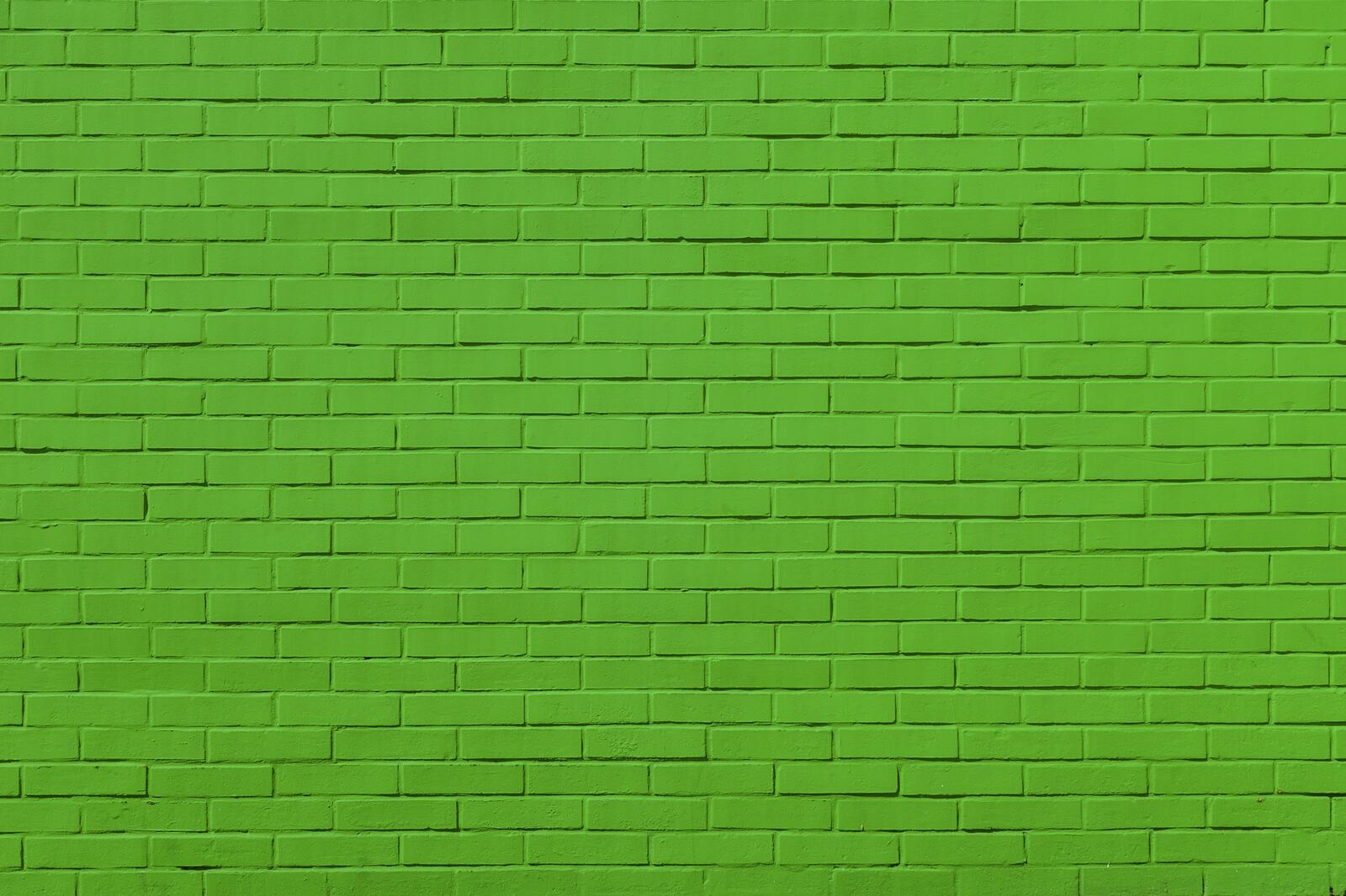 Free photo Brick wall painted green.