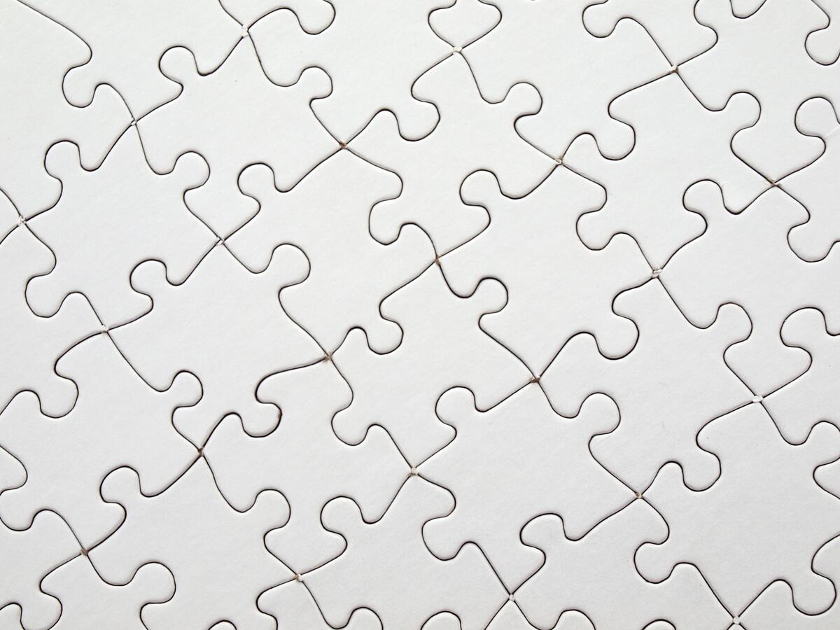 An assembled white puzzle