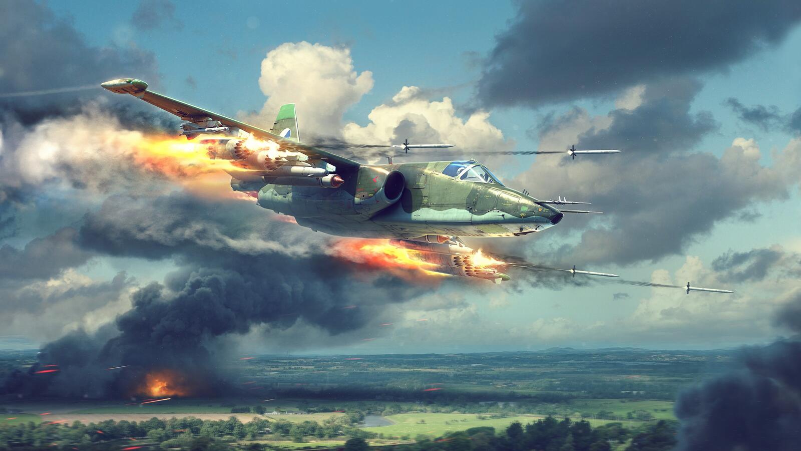 Бесплатное фото Су-25 в небе стреляет ракетами