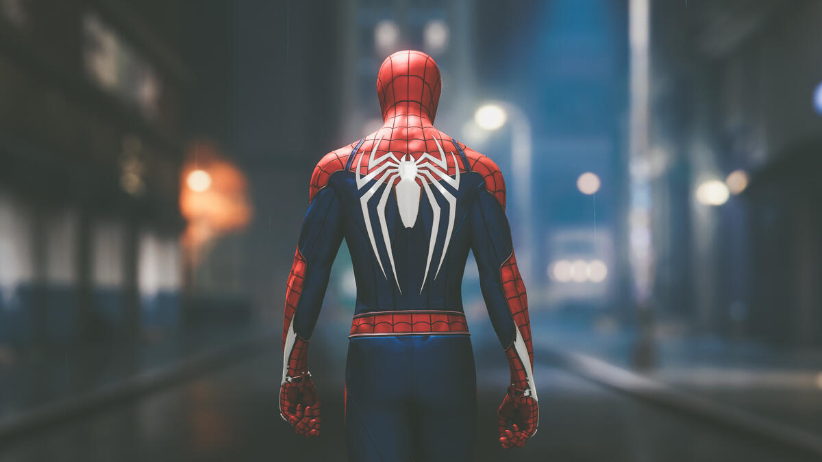 Spider-Man is standing back