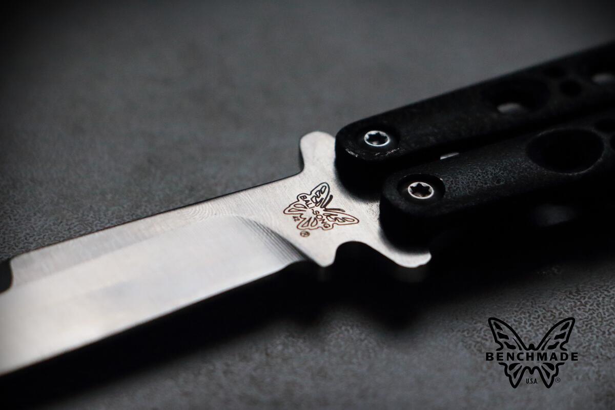Butterfly knife with butterfly logo