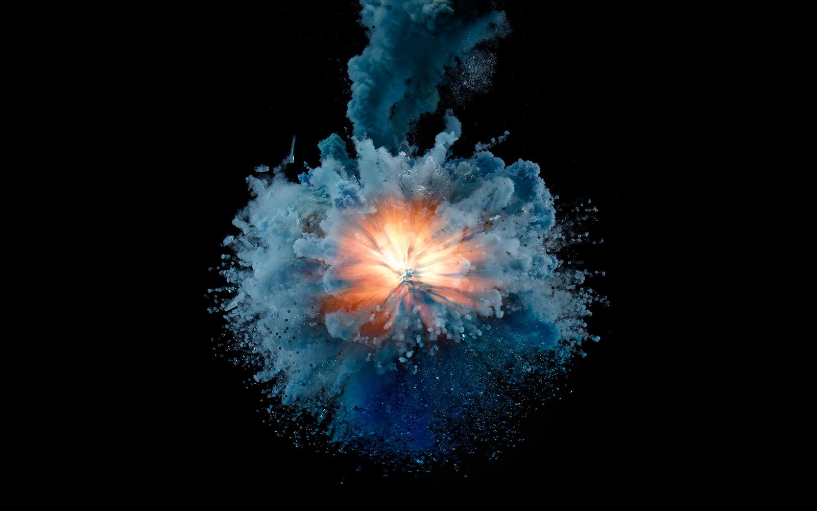 Free photo Explosion with smoke on a black background