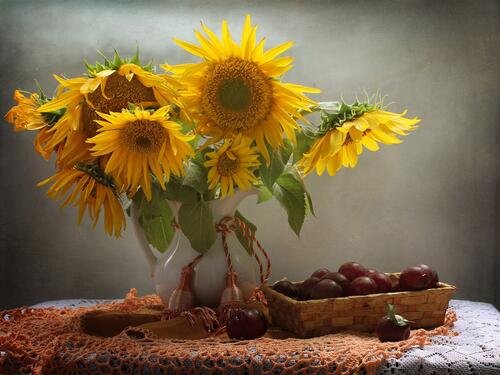 Homemade sunflowers in a white vase on the table