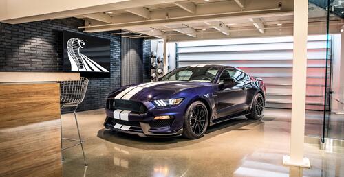 Ford mustang shelby gt350 in a clean, bright garage