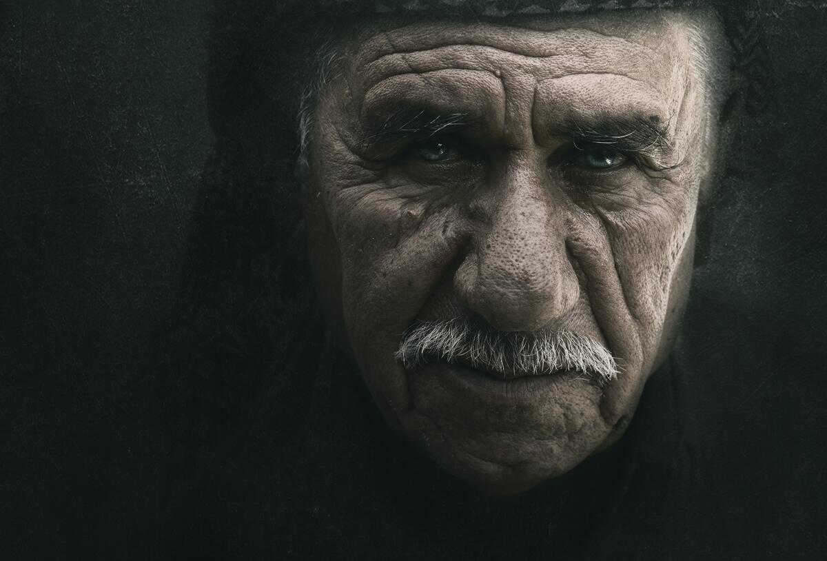 Portrait of an old man with a mustache
