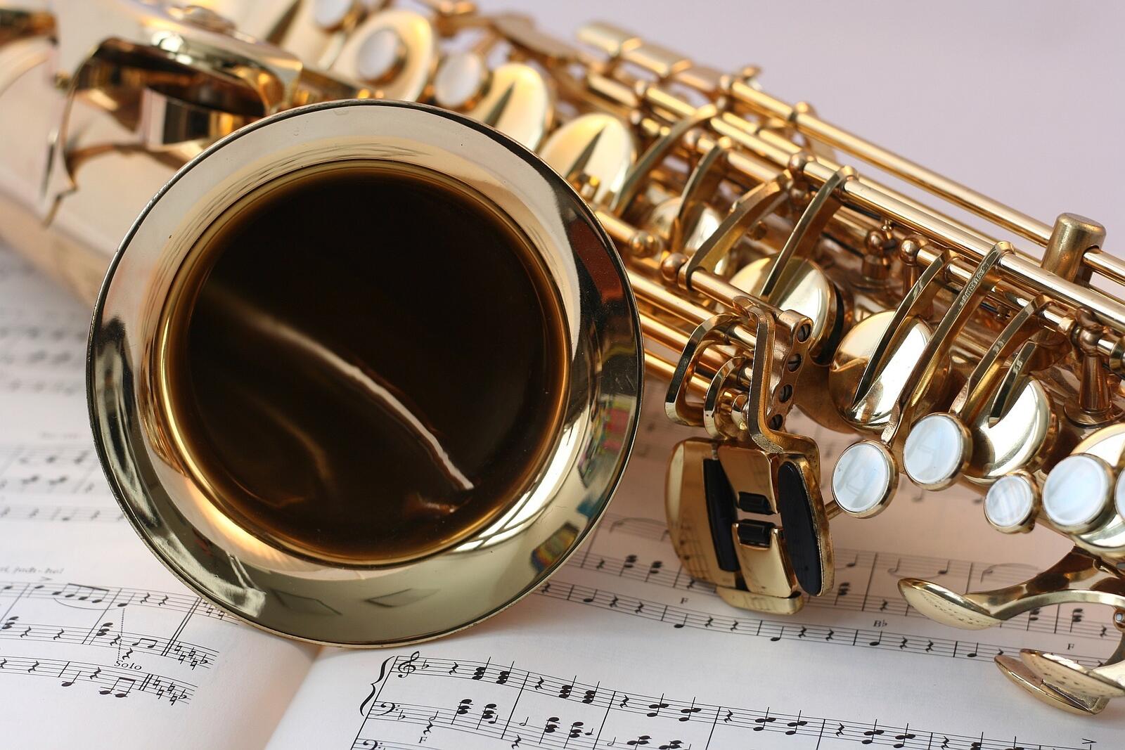 Wallpapers saxophone sheet music table on the desktop