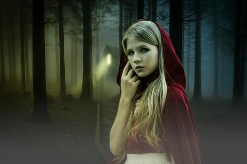 Little Red Riding Hood in the dark forest.