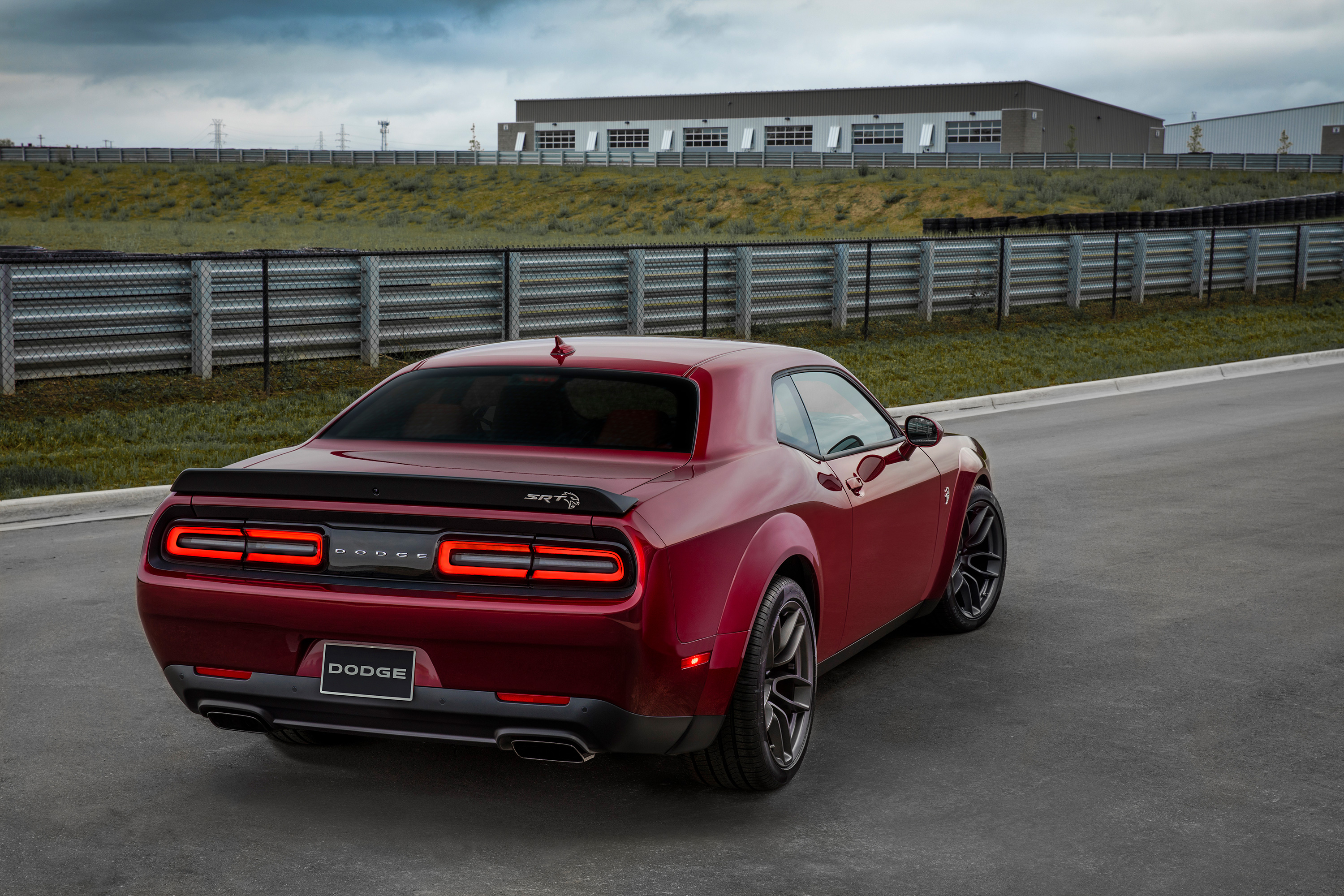 Dodge Challenger Srt Hellcat Widebody in red photographed from behind