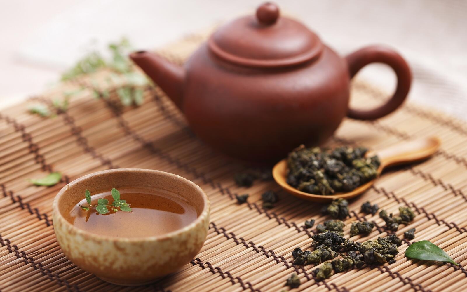 Бесплатное фото Чайник с китайским чаем