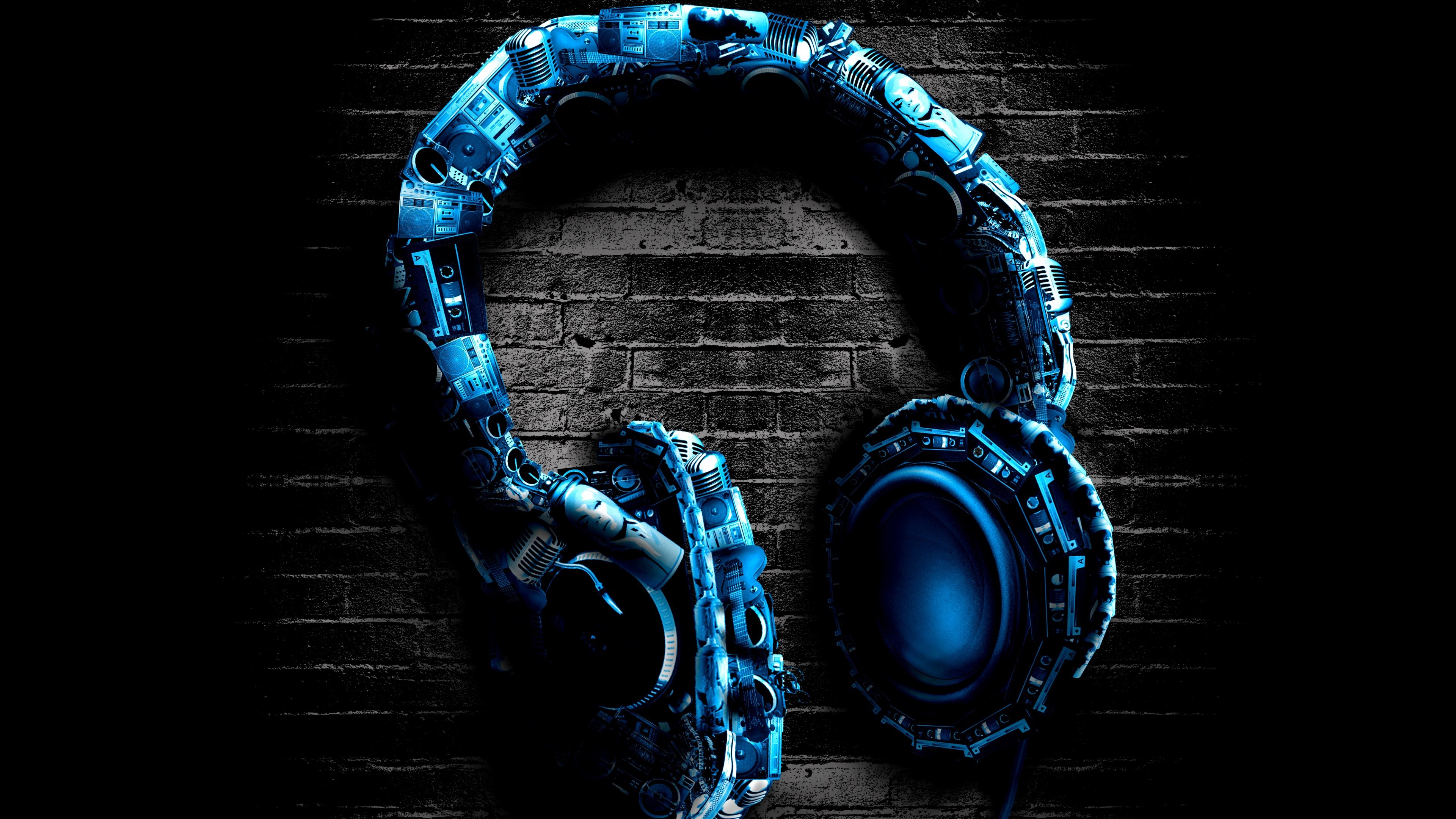 Free photo Drawing of headphones on a black brick wall