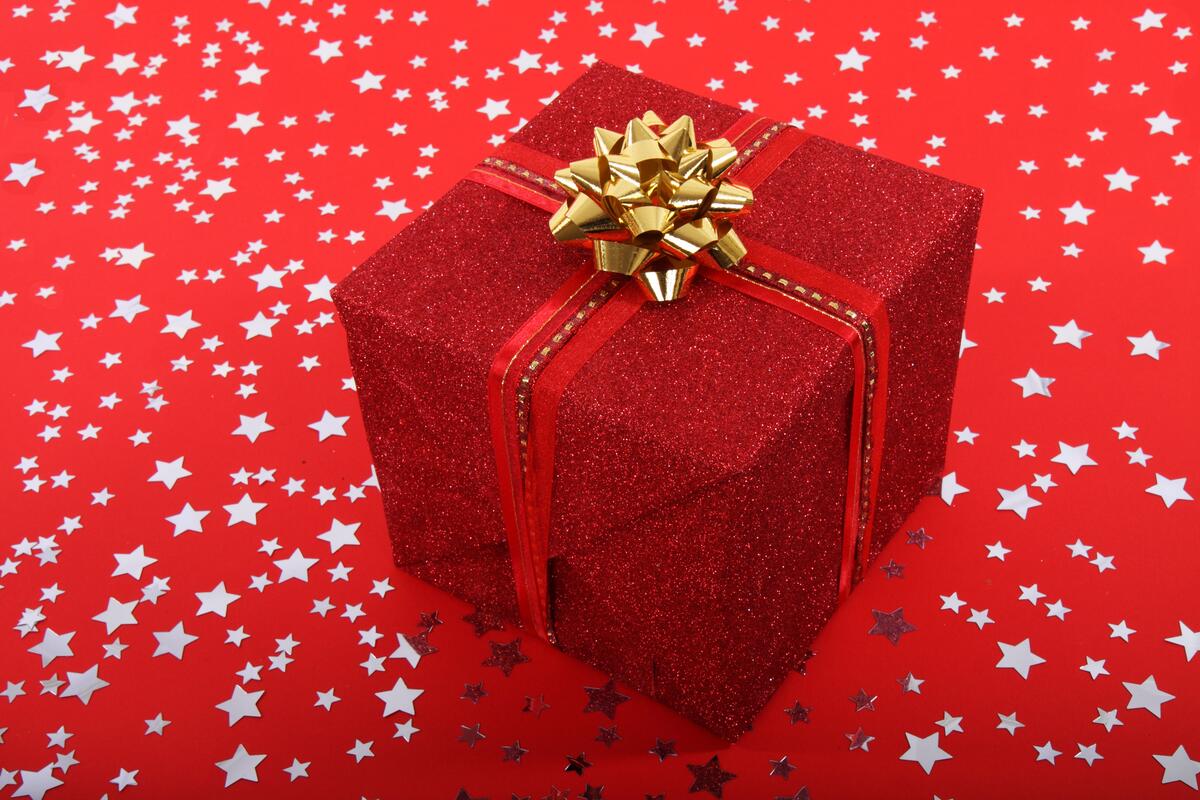 A gift wrapped in red paper.