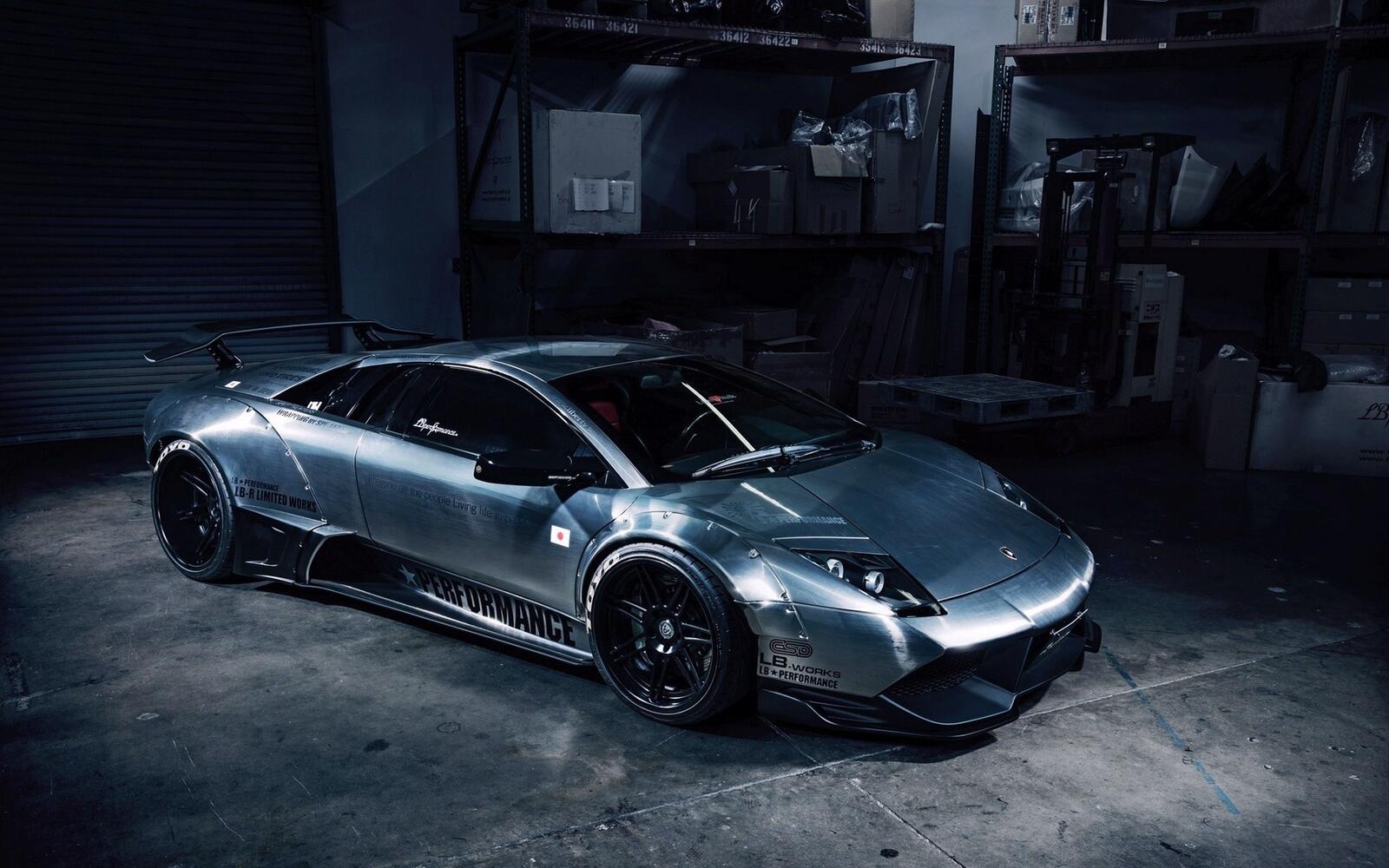 Free photo Lamborghini Reventon in a dark garage.