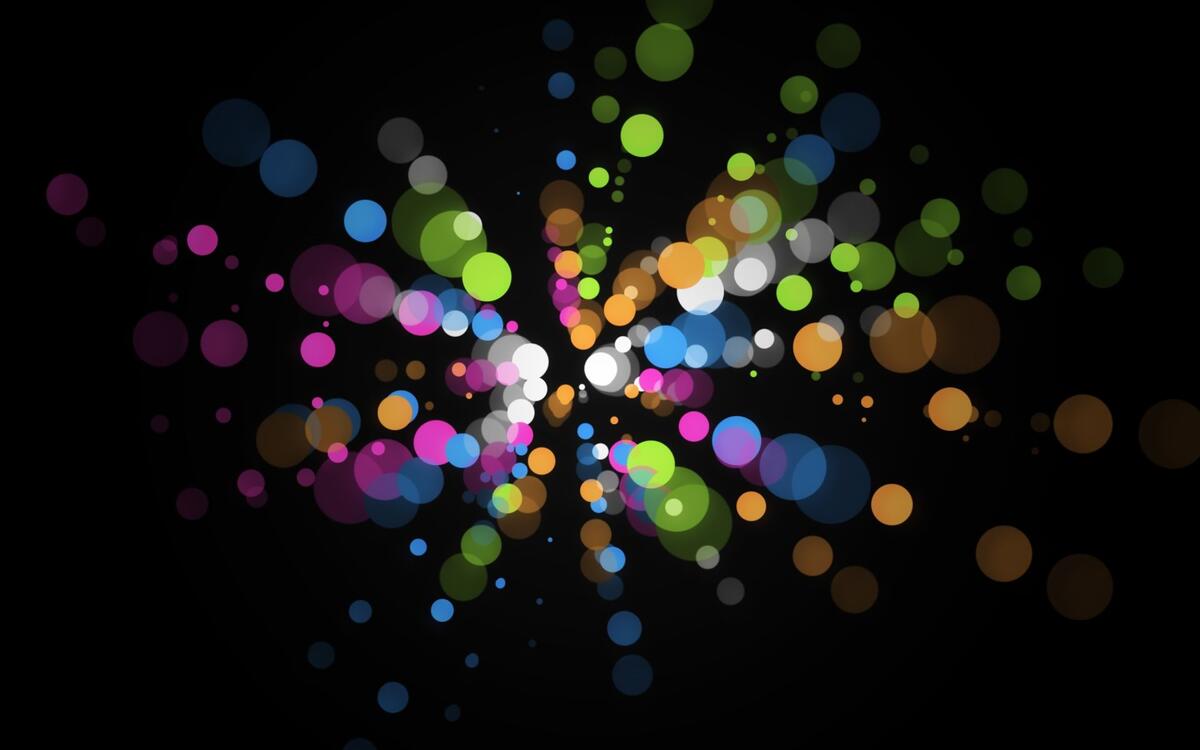Wallpaper with colored abstract circles on a black background