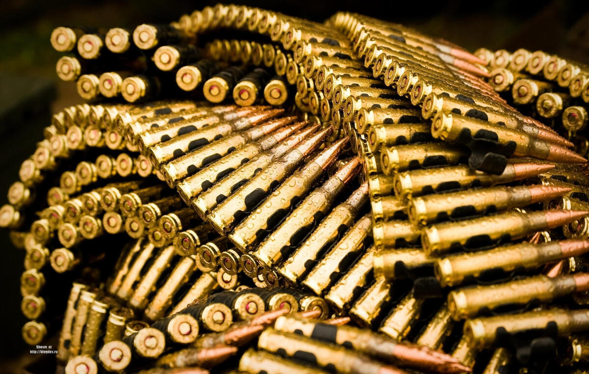 Machine gun belt with ammunition.