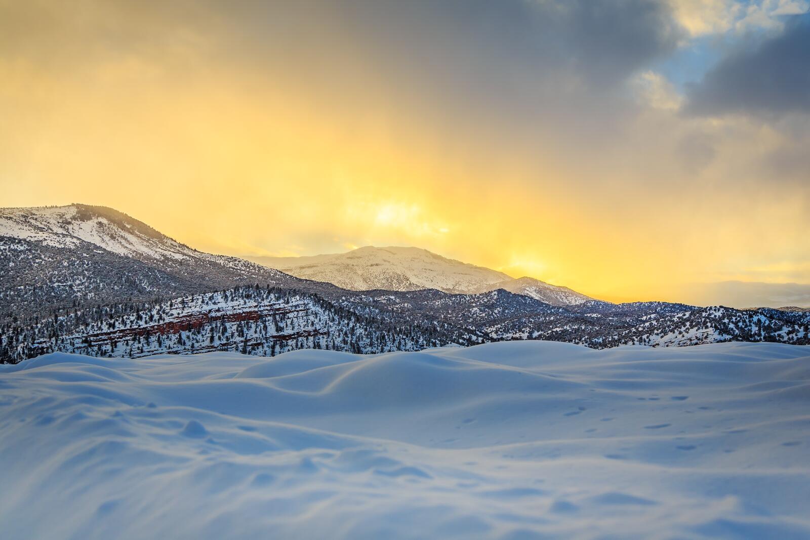 Free photo Sunset in the snowy mountains