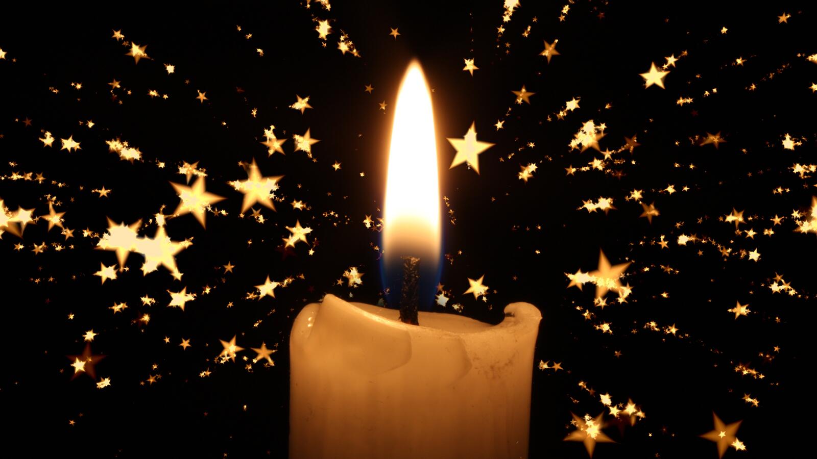 Пламя свечи со звездами