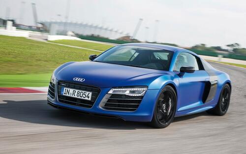 A blue Audi R8 in motion