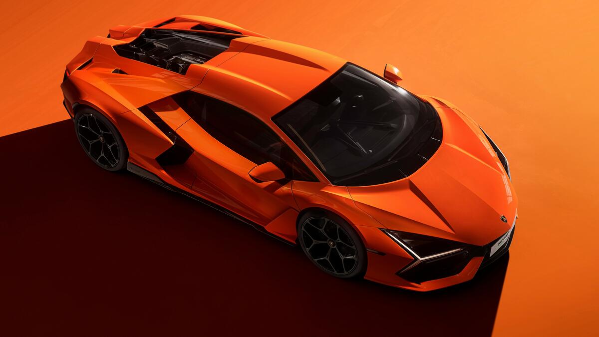 Orange Lamborghini Revuelto on orange background
