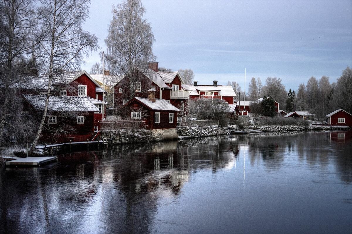 Houses by the river in Sweden in winter