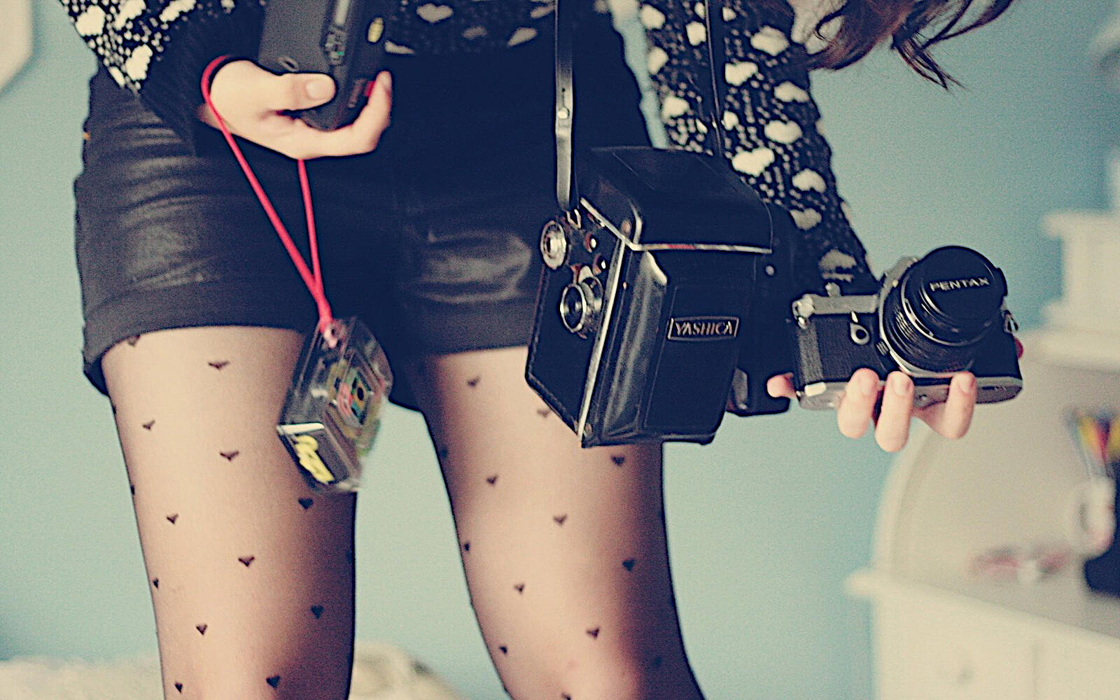 桌面上的壁纸照相机 腿 短裙