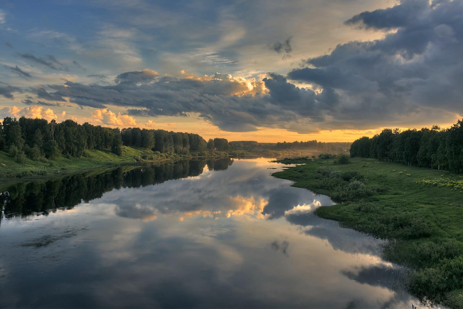 Free photo River at sunset