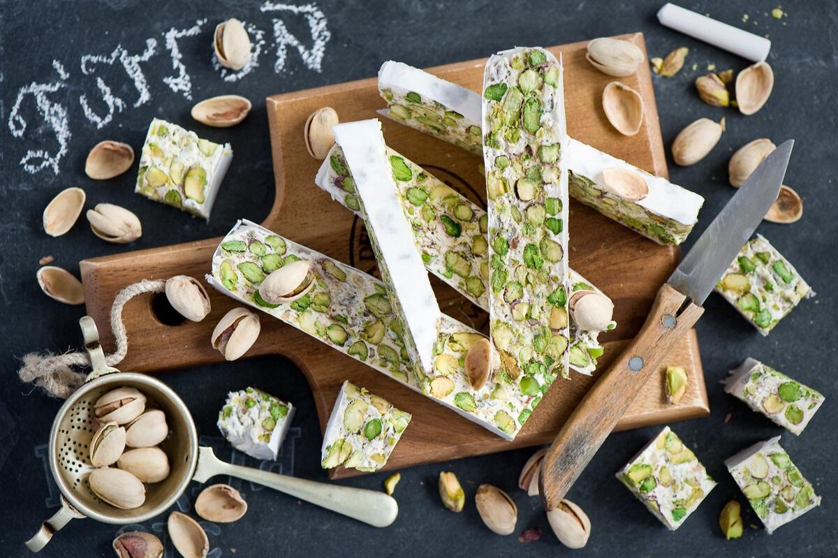 Homemade pistachio ice cream on a cutting board
