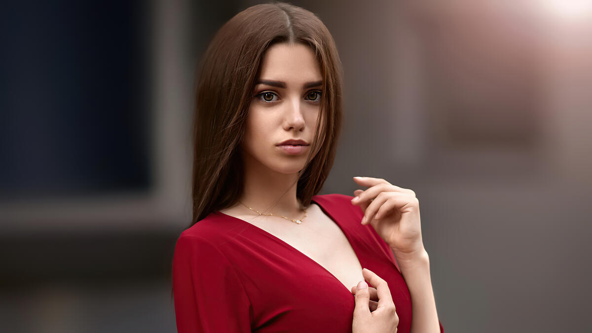 Pretty brown-haired girl in a red dress