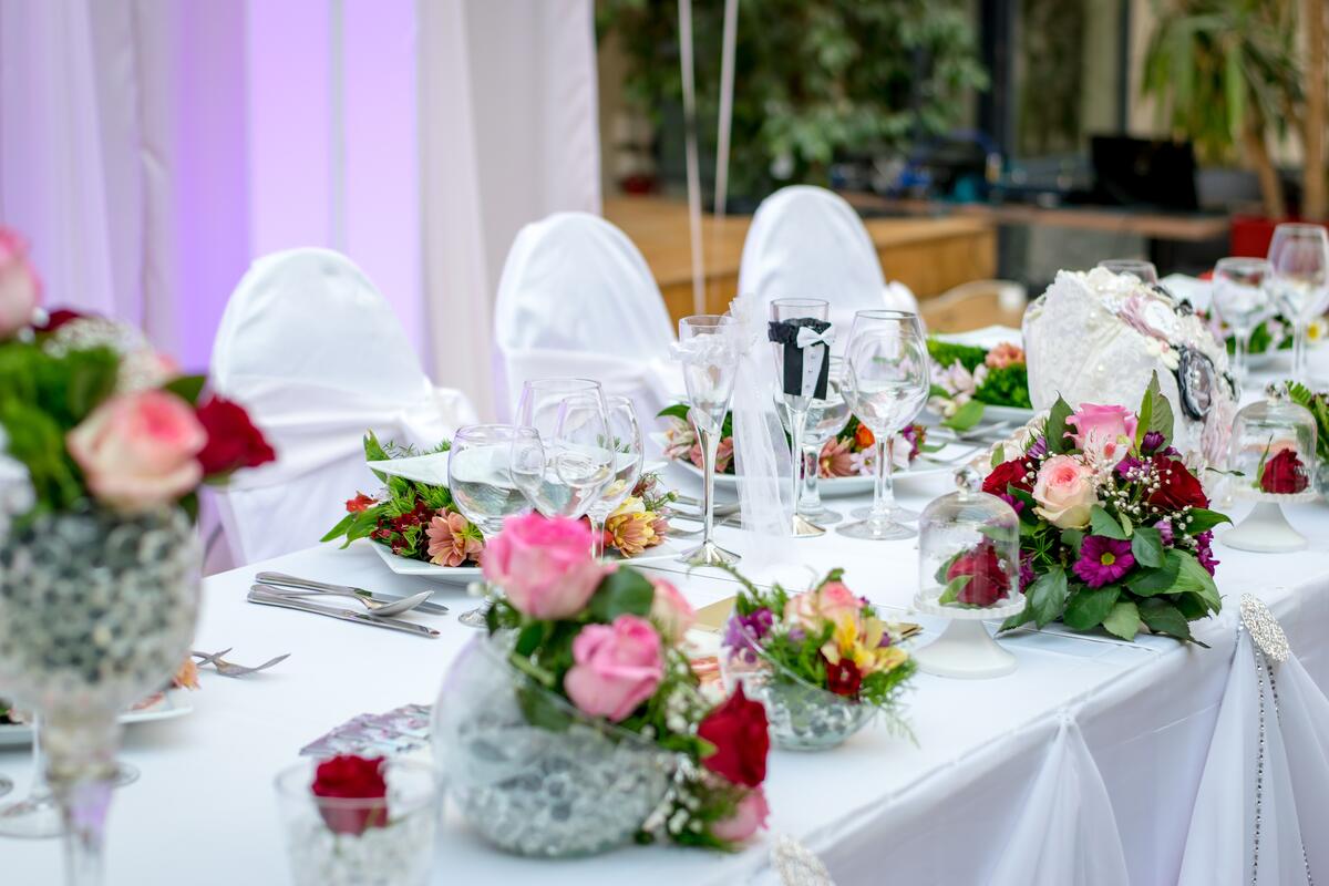 Decorated wedding table with bouquets of flowers