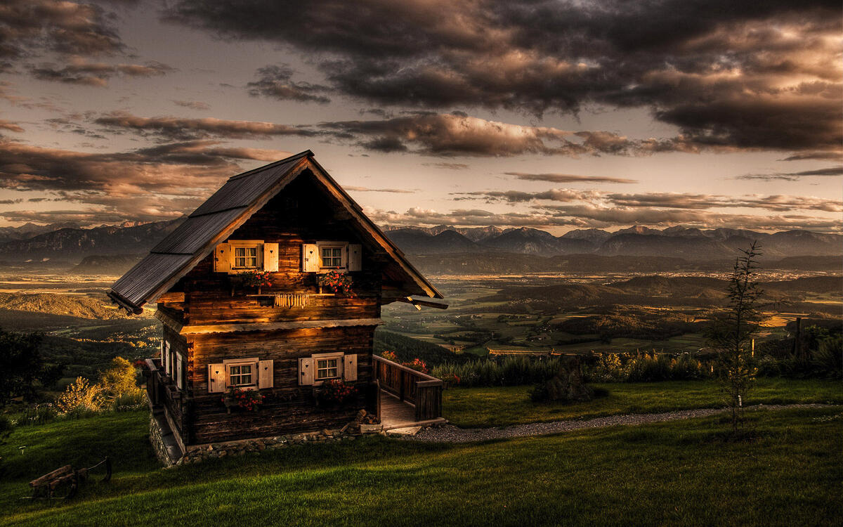 A wooden house on a hill